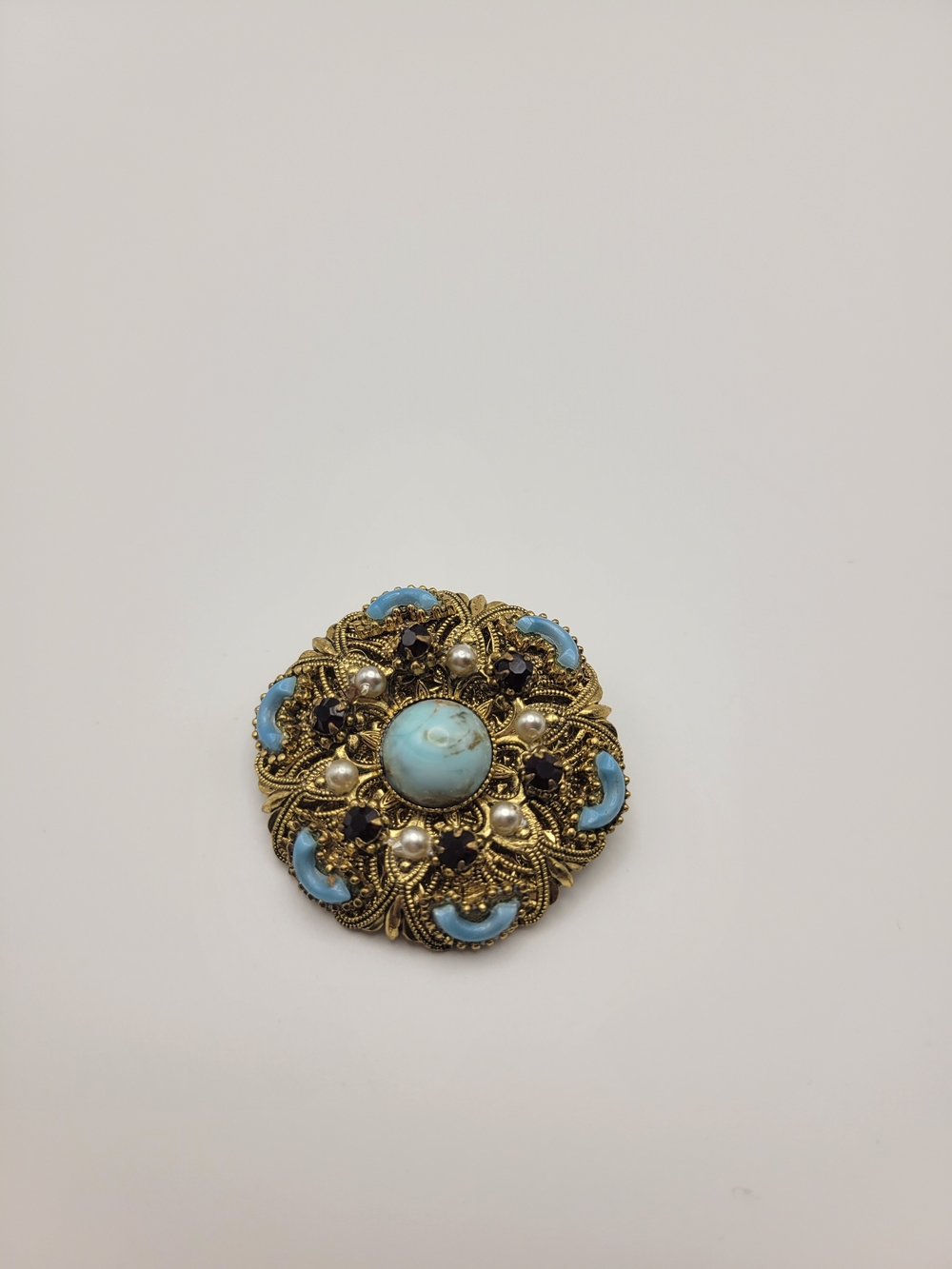Vintage-Style Gold Filigree Brooch with Blue Cabochon and Pearls